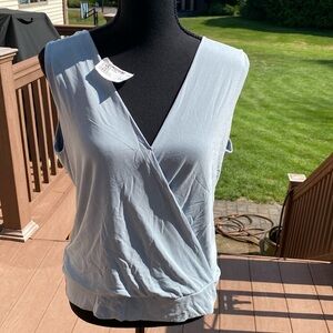 Veronica M NWT V-front and back sleeveless top. Stretchy. Wear with cami. Size L